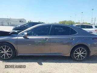 2023 Toyota Camry SE z VIN 4T1G11AK3PU735202, wystawiony jako IAAI lot #41874542 z przebiegiem 54 708 mil mil oraz . Historia ofert i sprzedaży dostępna na DreamBid. Obrazek 15.