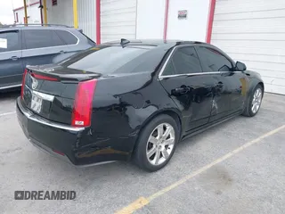 2011 Cadillac CTS Luxury with VIN 1G6DF5EYXB0103430, listed as a IAAI auction lot 42105337 with 205,069 mi miles and . Bid and sale history available at DreamBid. Image 4.