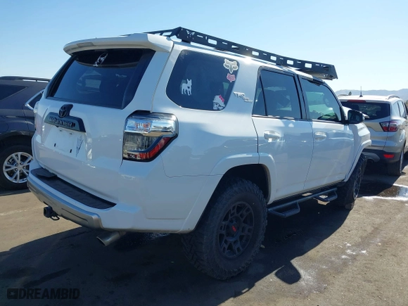 2019 Toyota 4Runner SR5 with VIN JTEBU5JR4K5659014, listed as a IAAI auction lot 41369141 with 90,376 mi miles. Bid and sale history available at carsss.com. Image 4.