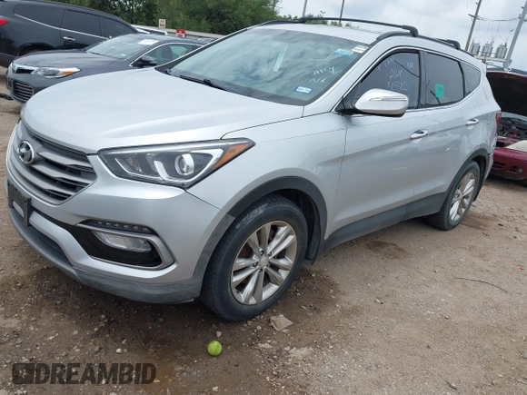 2018 Hyundai Santa Fe 2.0T z VIN 5XYZU4LA9JG537310, wystawiony jako IAAI lot #42393689 z przebiegiem Nie podano mil oraz . Historia ofert i sprzedaży dostępna na DreamBid. Obrazek 2.
