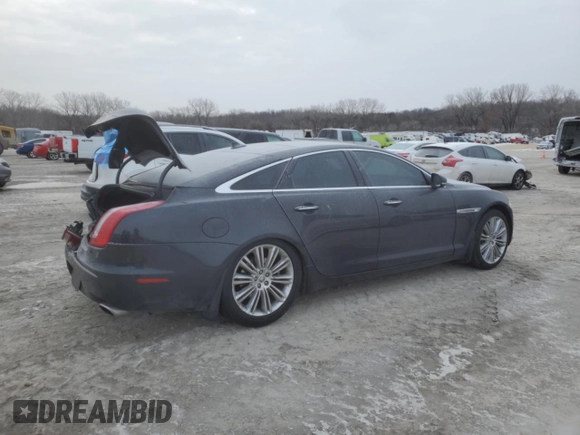 2013 Jaguar XJ with VIN SAJWA1C70D8V41578, listed as a Copart auction lot 89080585 with 76,063 mi miles and Salvage Title. Bid and sale history available at DreamBid. Image 3.