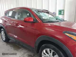2021 Hyundai Tucson Value with VIN KM8J33A44MU363524, listed as a IAAI auction lot 41854508 with 59,821 mi miles. Bid and sale history available at carsss.com. Image 13.