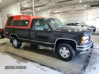 1996 GMC Sierra 1500 with VIN 1GTEK14M9TZ546010, listed as a Copart auction lot 54353635 with 252,481 mi miles and Salvage Title. Bid and sale history available at DreamBid. Image 4.