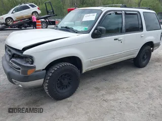 1999 Ford Explorer XLT z VIN 1FMZU34E1XZA39121, wystawiony jako IAAI lot #42107728 z przebiegiem 194 374 mil mil oraz . Historia ofert i sprzedaży dostępna na DreamBid. Obrazek 18.
