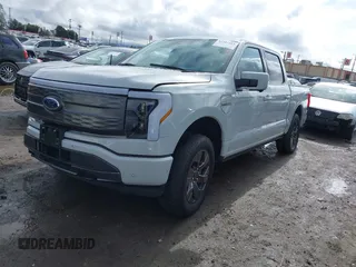 2023 Ford F-150 Lightning Pro with VIN 1FTVW1EV3PWG60491, listed as a IAAI auction lot 41507485 with 19,148 mi miles and . Bid and sale history available at DreamBid. Image 21.