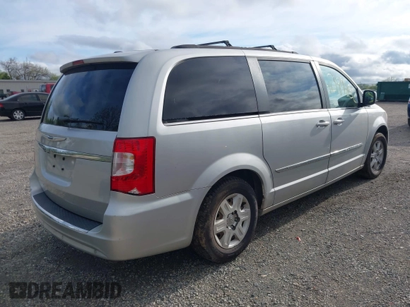 2011 Chrysler Town & Country Touring with VIN 2A4RR5DG4BR682109, listed as a IAAI auction lot 42189832 with 208,709 mi miles and . Bid and sale history available at DreamBid. Image 4.