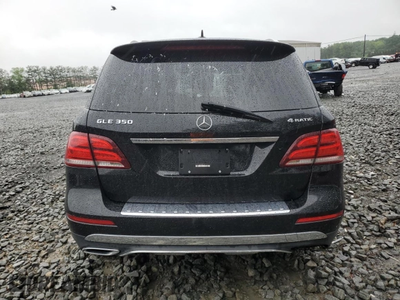 2018 Mercedes-Benz GLE 350 z VIN 4JGDA5HB7JB124754, wystawiony jako Copart lot #56665615 z przebiegiem 74 083 mil mil oraz Szkoda całkowita • Salvage title. Historia ofert i sprzedaży dostępna na DreamBid. Obrazek 6.