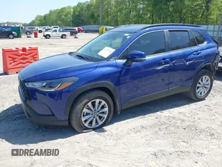 2023 Toyota Corolla Cross LE with VIN 7MUCAAAG8PV065431, listed as a IAAI auction lot 42031958 with 25,000 mi miles and . Bid and sale history available at DreamBid. Image 2.