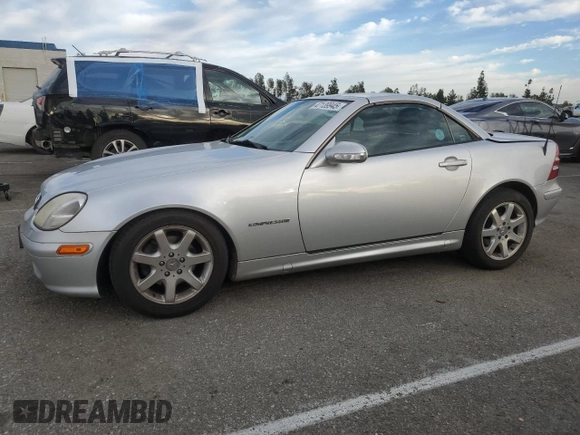 2001 Mercedes-Benz SLK 230 Kompressor with VIN WDBKK49F21F193606, listed as a Copart auction lot 47139945 with 156,424 mi miles and Salvage title. Bid and sale history available at DreamBid. Image 1.