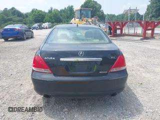 2005 Acura RL z VIN JH4KB16545C018873, wystawiony jako IAAI lot #42423476 z przebiegiem 237 834 mil mil oraz . Historia ofert i sprzedaży dostępna na DreamBid. Obrazek 16.