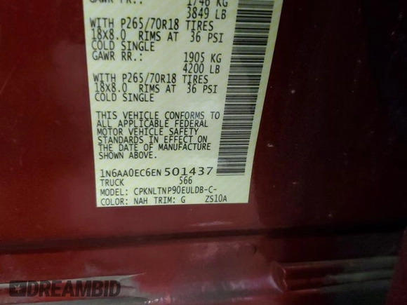 2014 Nissan Titan Pro-4X z VIN 1N6AA0EC6EN501437, wystawiony jako Copart lot #82822234 z przebiegiem 131 112 mil mil oraz Szkoda całkowita • Salvage title. Historia ofert i sprzedaży dostępna na DreamBid. Obrazek 13.