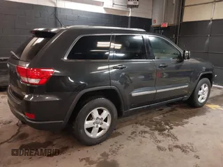 2011 Jeep Grand Cherokee 70th Anniversary with VIN 1J4RR4GG3BC566690, listed as a IAAI auction lot 41810545 with 173,886 mi miles. Bid and sale history available at carsss.com. Image 4.