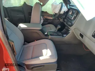 2015 GMC Canyon 2WD with VIN 1GTH5AE30F1182024, listed as a Copart auction lot 77032494 with 55,845 mi miles and Salvage Title. Bid and sale history available at carsss.com. Image 10.