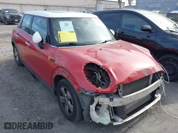 2015 MINI Hardtop 4 Door with VIN WMWXS5C59FT832549, listed as a IAAI auction lot 42106686 with 149,358 mi miles and . Bid and sale history available at DreamBid. Image 1.