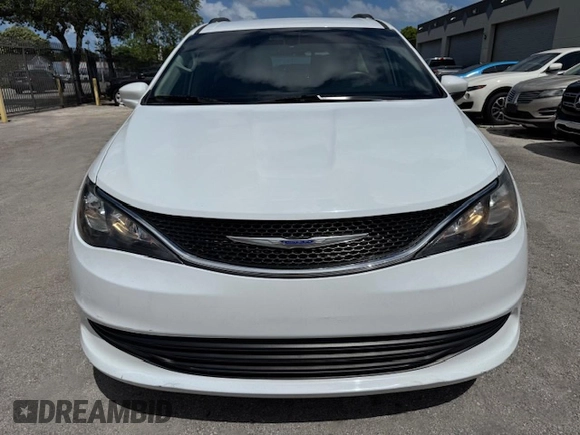 2020 Chrysler Voyager LXI with VIN 2C4RC1DG9LR144605, listed as a Copart auction lot 54107585 with 140,575 mi miles and Salvage Title. Bid and sale history available at carsss.com. Image 5.