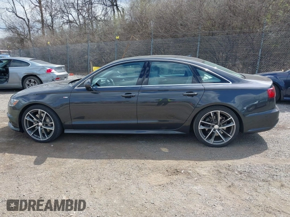 2016 Audi A6 2.0T Premium Plus with VIN WAUGFAFC7GN095669, listed as a IAAI auction lot 41894313 with 84,725 mi miles. Bid and sale history available at carsss.com. Image 15.