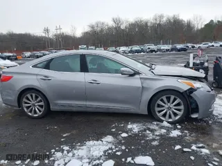 2014 Hyundai Azera Limited with VIN KMHFH4JG6EA361378, listed as a IAAI auction lot 41557210 with 58,561 mi miles. Bid and sale history available at carsss.com. Image 13.