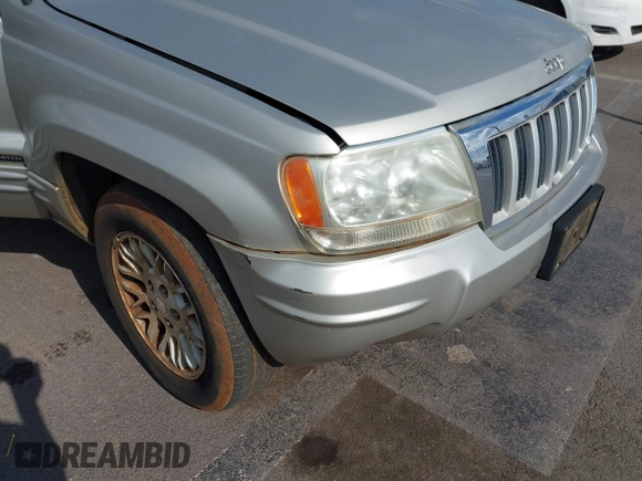 2004 Jeep Grand Cherokee Limited with VIN 1J4GW58N54C299669, listed as a IAAI auction lot 42369745 with 90,240 mi miles and . Bid and sale history available at DreamBid. Image 6.