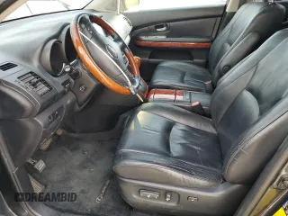 2007 Lexus RX 400h z VIN JTJGW31U972002681, wystawiony jako Copart lot #78883974 z przebiegiem 288 019 mil mil oraz Szkody całkowita. Historia ofert i sprzedaży dostępna na DreamBid. Obrazek 7.