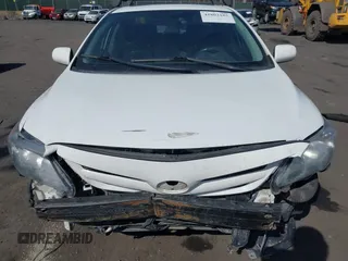 2011 Toyota Corolla L with VIN 2T1BU4EE2BC673146, listed as a IAAI auction lot 41802185 with 183,180 mi miles. Bid and sale history available at carsss.com. Image 6.