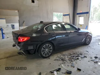 2018 BMW 5 Series 540i xDrive with VIN WBAJE7C56JWC57314, listed as a Copart auction lot 60610715 with 73,015 mi miles and Salvage title. Bid and sale history available at DreamBid. Image 3.