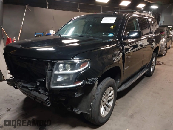 2017 Chevrolet Tahoe LT with VIN 1GNSKBKC4HR231701, listed as a IAAI auction lot 41201223 with 80,045 mi miles and . Bid and sale history available at DreamBid. Image 2.