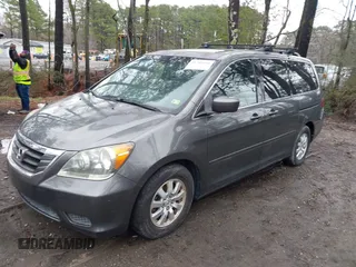 2010 Honda Odyssey EX-L with VIN 5FNRL3H75AB021480, listed as a IAAI auction lot 41793994 with 169,386 mi miles and . Bid and sale history available at DreamBid. Image 2.