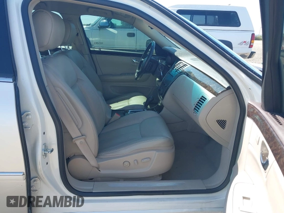 2008 Cadillac DTS 1SC with VIN 1G6KD57YX8U209792, listed as a IAAI auction lot 42003838 with 113,026 mi miles and . Bid and sale history available at carsss.com. Image 5.