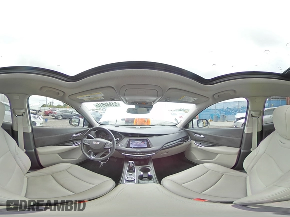 2023 Cadillac XT4 FWD Premium Luxury z VIN 1GYFZCR44PF105116, wystawiony jako Copart lot #51945915 z przebiegiem 20 669 mil mil oraz Szkoda całkowita • Salvage title. Historia ofert i sprzedaży dostępna na DreamBid. Obrazek 16.