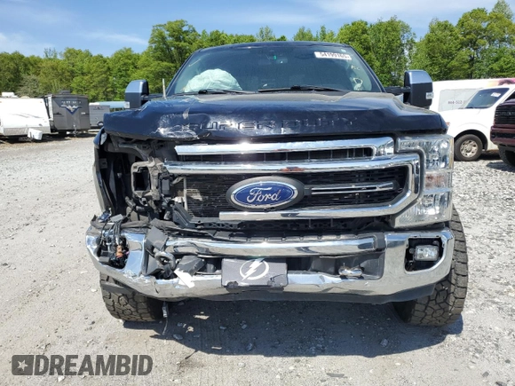 2021 Ford Super Duty F-250 SRW XL with VIN 1FT7W2BT1MEC51277, listed as a Copart auction lot 54199165 with 99,324 mi miles and Salvage Title. Bid and sale history available at carsss.com. Image 5.