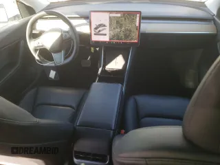 2021 Tesla Model Y Long Range z VIN 5YJYGDEE2MF100232, wystawiony jako Copart lot #50183425 z przebiegiem 95 527 mil mil oraz Szkoda całkowita • Salvage title. Historia ofert i sprzedaży dostępna na DreamBid. Obrazek 8.