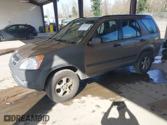 2002 Honda CR-V LX z VIN JHLRD78512C007757, wystawiony jako IAAI lot #41885302 z przebiegiem 177 892 mil mil oraz . Historia ofert i sprzedaży dostępna na DreamBid. Obrazek 17.