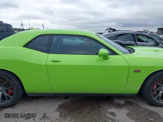 2015 Dodge Challenger SRT 392 with VIN 2C3CDZDJ3FH720636, listed as a IAAI auction lot 41285219 with 149,706 mi miles. Bid and sale history available at carsss.com. Image 13.
