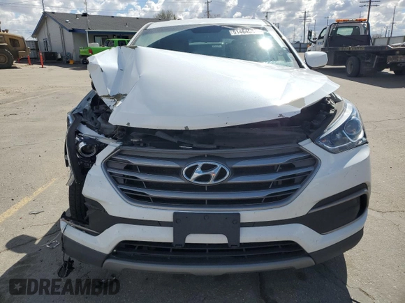 2018 Hyundai Santa Fe 2.4L z VIN 5NMZTDLB1JH076587, wystawiony jako Copart lot #51484585 z przebiegiem 106 026 mil mil oraz Szkoda całkowita • Salvage title. Historia ofert i sprzedaży dostępna na DreamBid. Obrazek 5.