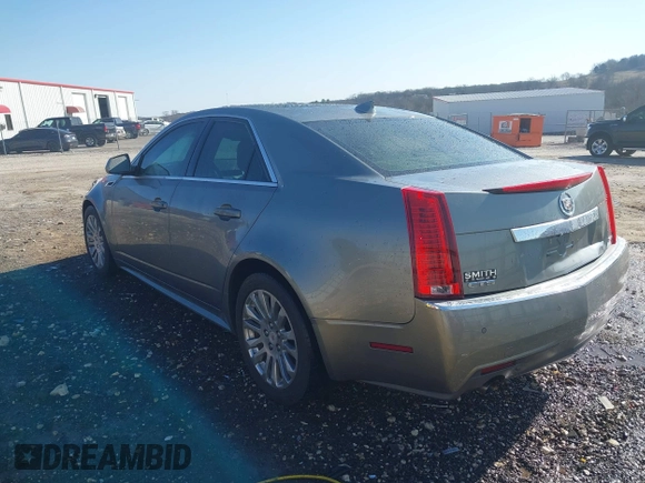 2011 Cadillac CTS Performance with VIN 1G6DK5ED6B0156490, listed as a IAAI auction lot 41346869 with 145,627 mi miles and . Bid and sale history available at DreamBid. Image 3.