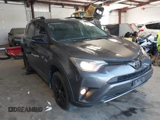 2018 Toyota RAV4 XLE with VIN 2T3RFREV7JW737143, listed as a IAAI auction lot 42000986 with 88,290 mi miles and . Bid and sale history available at DreamBid. Image 1.