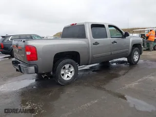 2007 Chevrolet Silverado 1500 LTZ with VIN 2GCEK13M571637081, listed as a IAAI auction lot 41085702 with 202,998 mi miles. Bid and sale history available at carsss.com. Image 4.