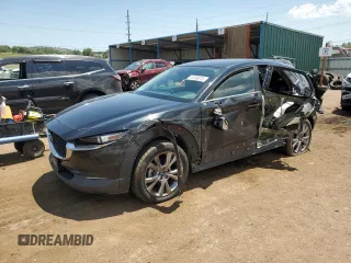 2020 Mazda CX-30 Select with VIN 3MVDMBCL0LM115138, listed as a Copart auction lot 61098075 with 85,974 mi miles and Salvage title. Bid and sale history available at DreamBid. Image 1.