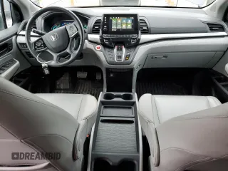 2018 Honda Odyssey EX-L with VIN 5FNRL6H78JB091153, listed as a Copart auction lot 52743715 with 69,849 mi miles and Salvage Title. Bid and sale history available at DreamBid. Image 8.