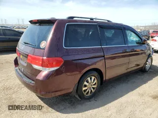 2010 Honda Odyssey EX-L with VIN 5FNRL3H60AB041353, listed as a Copart auction lot 52801315 with 120,253 mi miles and Salvage Title. Bid and sale history available at DreamBid. Image 3.