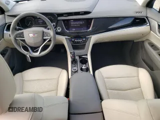 2023 Cadillac XT6 FWD Premium Luxury with VIN 1GYKPCRS5PZ120161, listed as a Copart auction lot 54614235 with 39,700 mi miles and Salvage title. Bid and sale history available at DreamBid. Image 8.