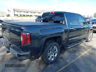 2018 GMC Sierra 1500 with VIN 3GTU1NEC7JG257796, listed as a IAAI auction lot 41570419 with 92,186 mi miles and . Bid and sale history available at DreamBid. Image 4.