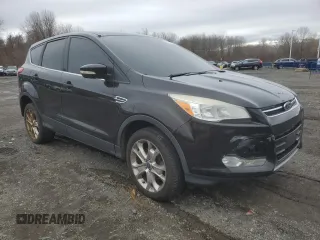 2013 Ford Escape SEL with VIN 1FMCU9HX1DUD19246, listed as a Copart auction lot 48191585 with 165,084 mi miles and Clean Title. Bid and sale history available at carsss.com. Image 4.