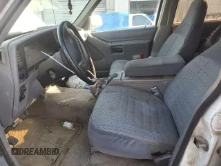 1994 Ford Explorer Eddie Bauer z VIN 1FMDU34X4RUE80513, wystawiony jako Copart lot #80094394 z przebiegiem 293 609 mil mil oraz Szkoda całkowita • Salvage title. Historia ofert i sprzedaży dostępna na DreamBid. Obrazek 7.
