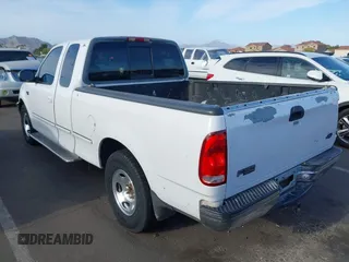 1998 Ford F-150 with VIN 1FTZX1720WKB74924, listed as a IAAI auction lot 42046778 with 240,725 mi miles and . Bid and sale history available at DreamBid. Image 3.