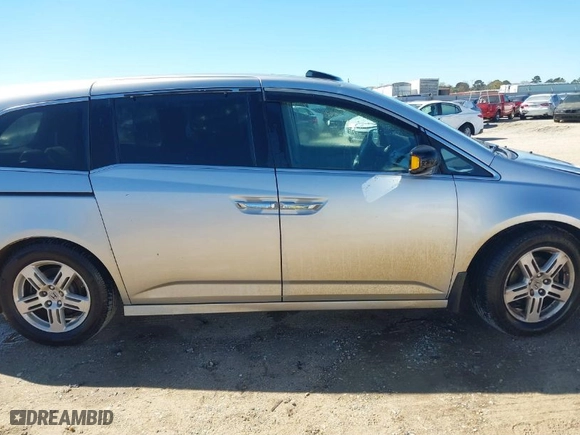 2013 Honda Odyssey Touring with VIN 5FNRL5H93DB076463, listed as a IAAI auction lot 41819994 with 188,911 mi miles. Bid and sale history available at carsss.com. Image 13.