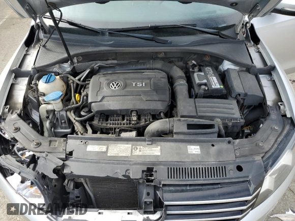 2014 Volkswagen Passat SE z VIN 1VWBT7A30EC076841, wystawiony jako Copart lot #52970685 z przebiegiem 142 628 mil mil oraz Szkoda całkowita • Salvage title. Historia ofert i sprzedaży dostępna na DreamBid. Obrazek 11.