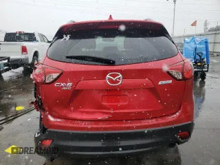2014 Mazda CX-5 Grand Touring with VIN JM3KE4DY6E0309925, listed as a Copart auction lot 53521105 with 161,579 mi miles and Salvage Title. Bid and sale history available at carsss.com. Image 6.