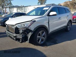 2016 Hyundai Santa Fe SE with VIN KM8SR4HF1GU141799, listed as a IAAI auction lot 41348405 with 99,884 mi miles. Bid and sale history available at carsss.com. Image 2.