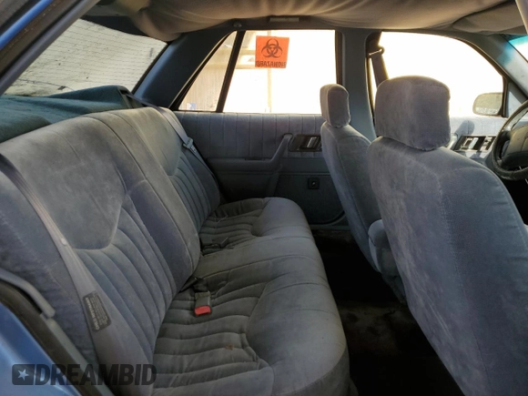 1994 Oldsmobile Cutlass z VIN 1G3WH55M1RD353266, wystawiony jako Copart lot #74058544 z przebiegiem 157 494 mil mil oraz Szkody całkowita. Historia ofert i sprzedaży dostępna na DreamBid. Obrazek 10.